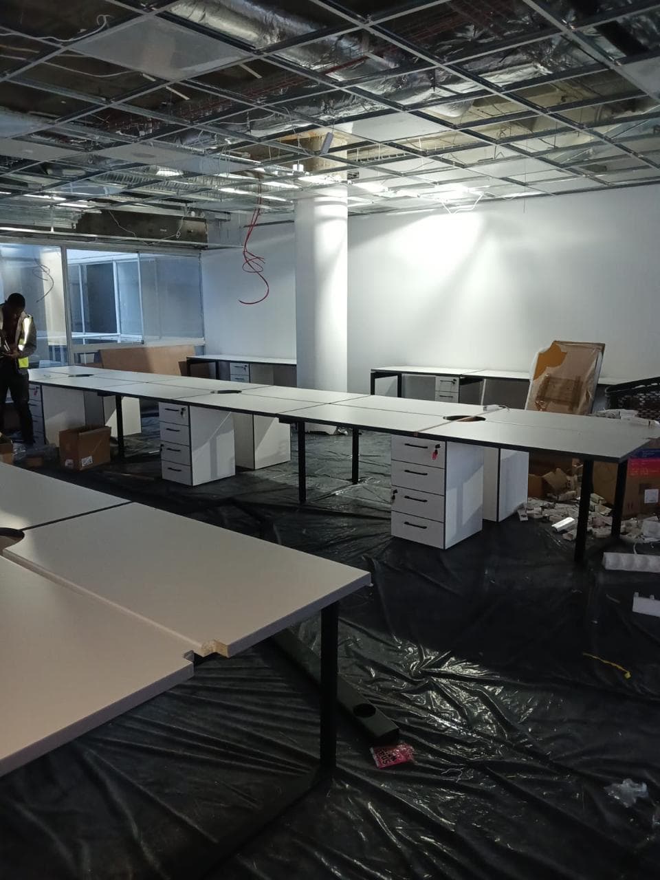 Office lighting installation in progress at Amazon Building